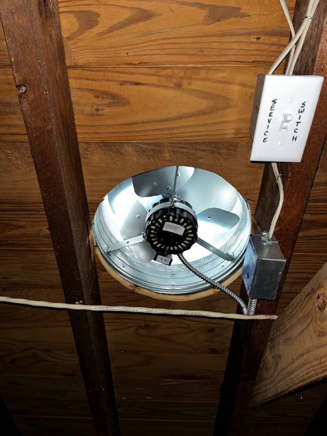 Photo depicting a fan producing attic ventilation in Glen Rock NJ